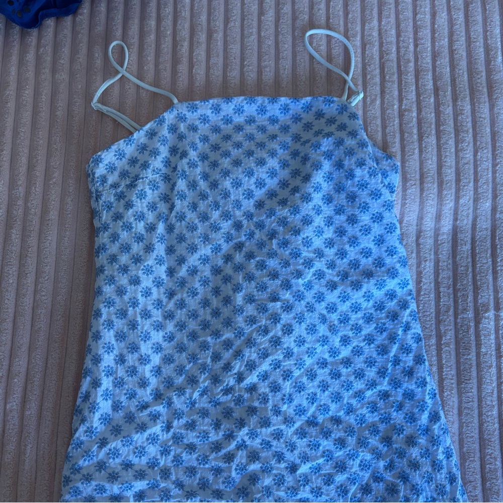 White mini dress, baby blue flowers